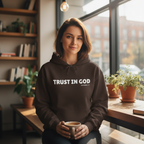 Person wearing brown Trust in God hoodie