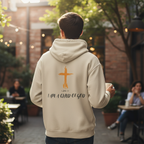 Person wearing cream Child of God hoodie