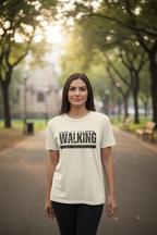 Person wearing Cream Just Keep Walking T-Shirt